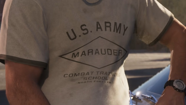 Close-up of Jason's grey army T-shirt reading U.S. Army, Marauder, Combat Training School, North Fort Law